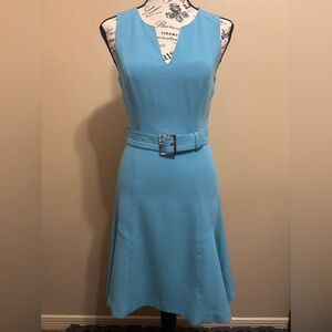 New White House Black Market Dress with Belt and a Sleeveless V Neck
Size 00